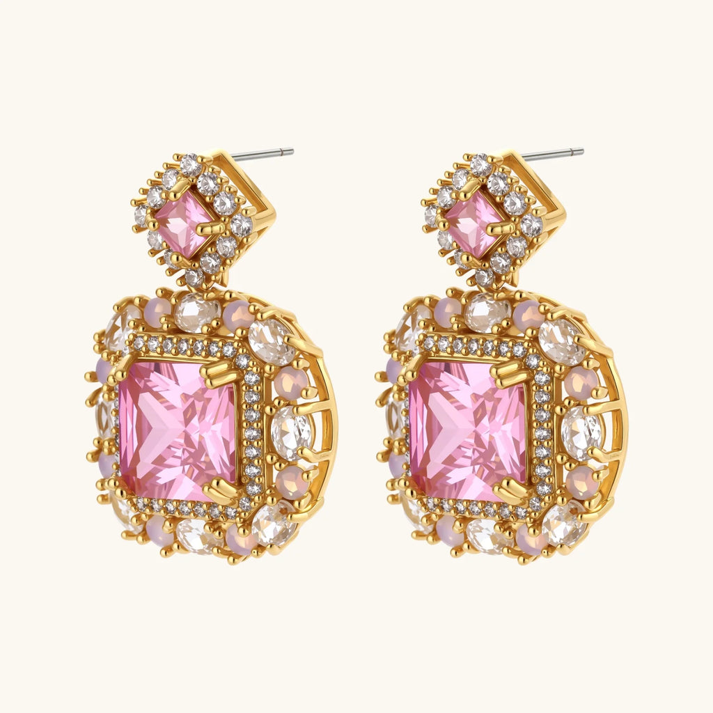 14K gold-plated jewelry set featuring square-cut cubic zirconia stones in ornate layered settings on white background.